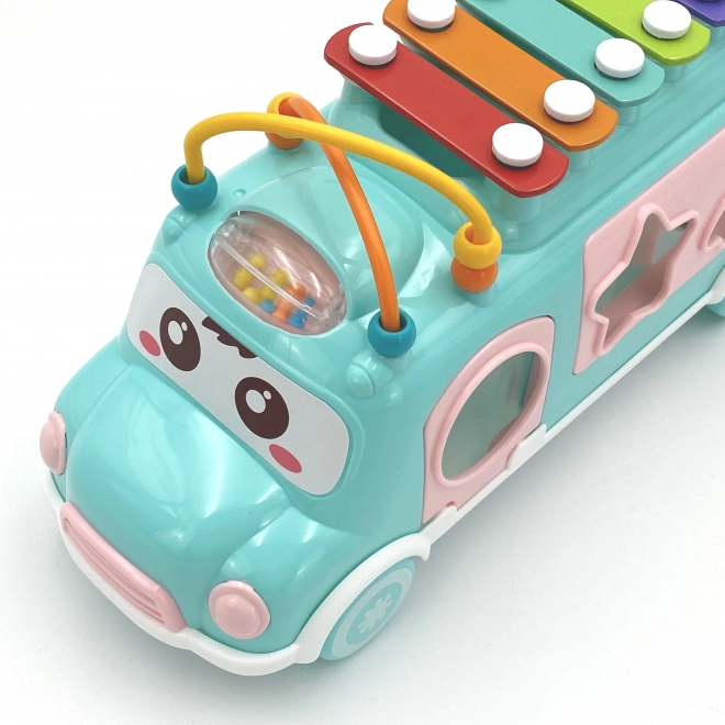 Voiture musicale avec trieur et xylophone vert Woopie