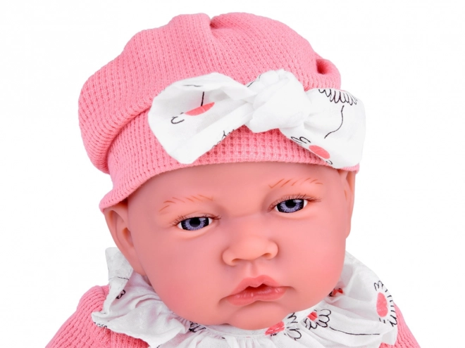 Interactieve pop van 45 cm in roze outfit