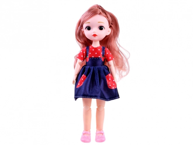Prachtige pop met beweegbare ledematen en lang haar