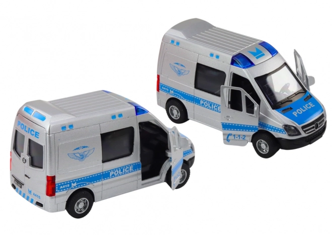 Politieauto 1:32 met opengaande deuren, lichten en geluiden