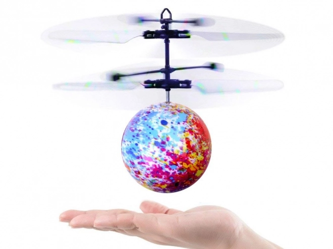 Vliegende verlichte Disco bal bestuurd met de hand