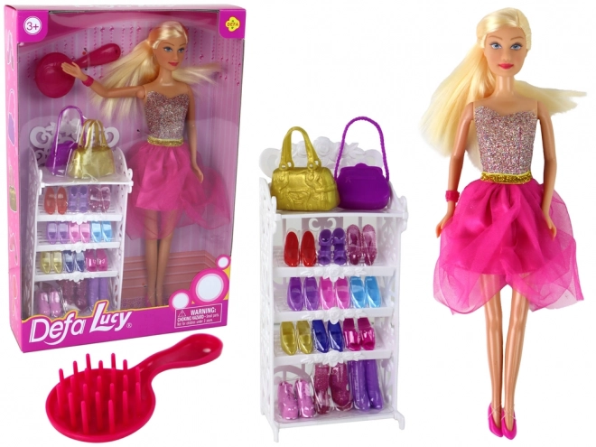 Poupée Lucy avec une robe rose scintillante et un ensemble de chaussures