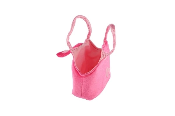 Roze pluchen poedel in tas