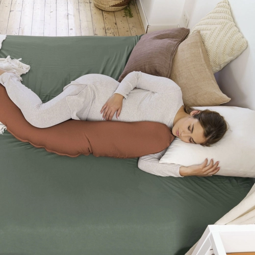 Soutien ergonomique pour la grossesse et le sommeil sur le côté