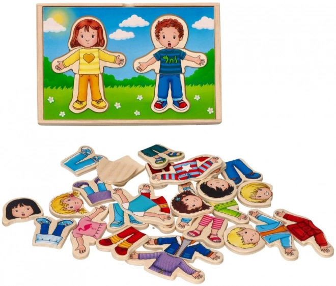 Houten puzzel voor kinderen Kleden met jongen en meisje