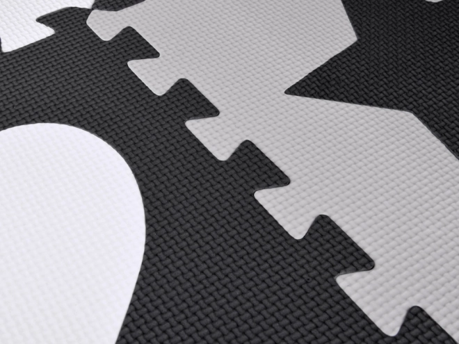 Contrasterende schuim puzzelmat met vormen
