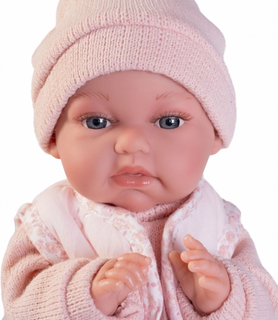 realistische Babypuppe mit Bewegungsfunktion und weichem Stoffkörper 34 cm