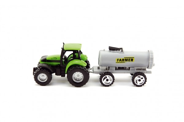 Groene tractor met grijze aanhangwagen