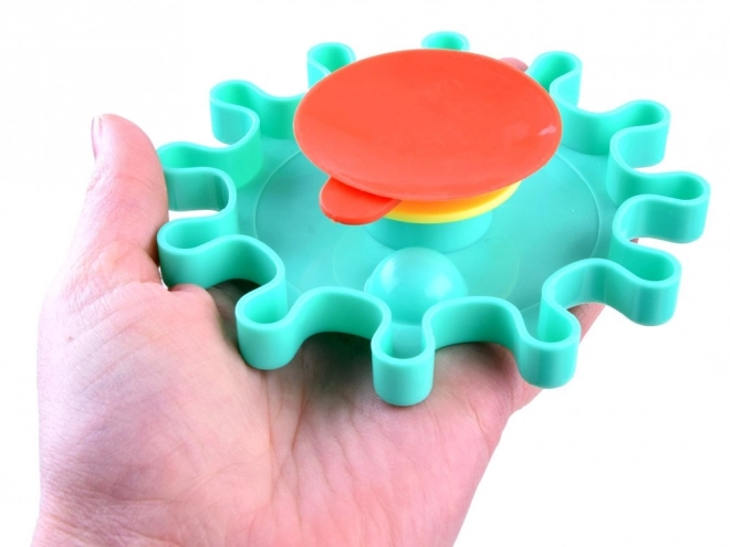 Gekleurde tandwielen voor in het water