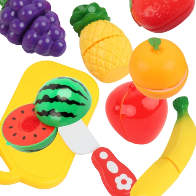 Woopie Fruits sur planche avec couteau
