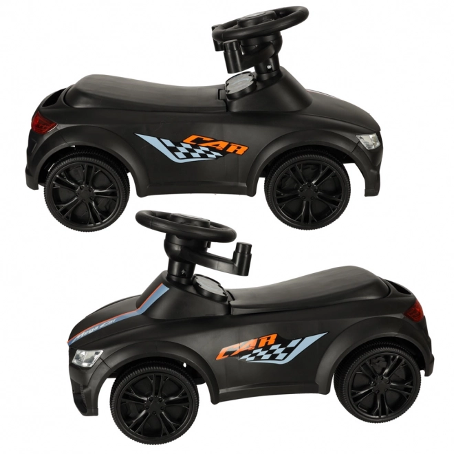 zwart kinderauto met muziek en lichtjes