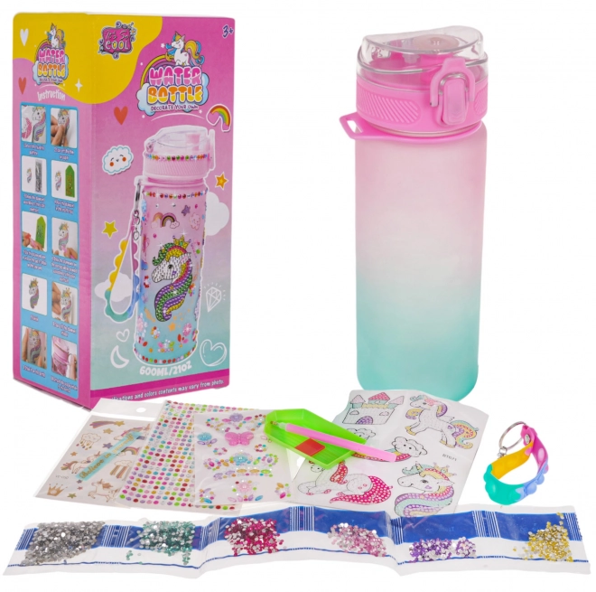 Fles met eenhoorn en accessoires