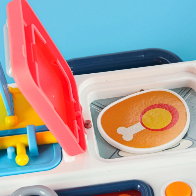 Montessori Manipulationsbrett mit Küchenelementen und lernender Uhr