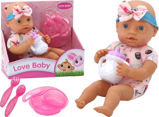 Cloth baby doll with pink outfit with flamingos and feeding set