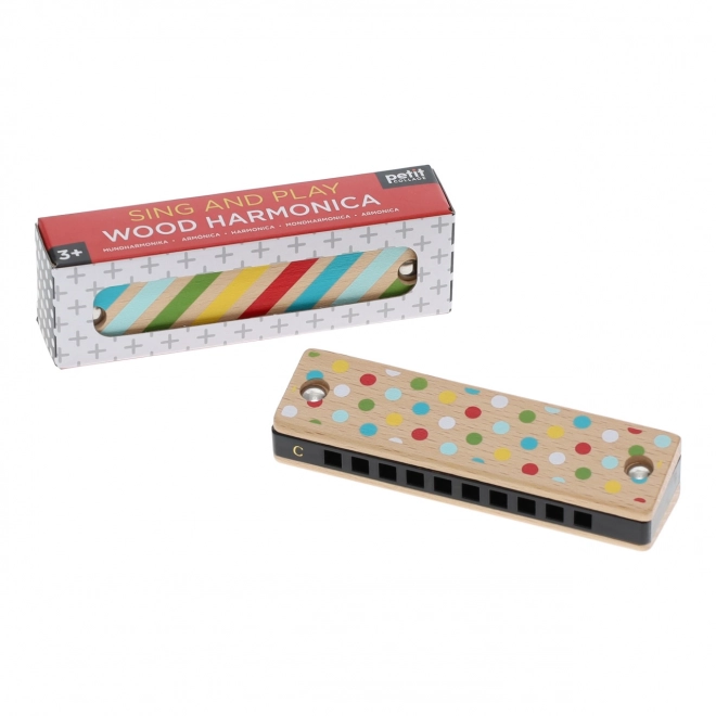 Harmonica en bois avec rayures et pois