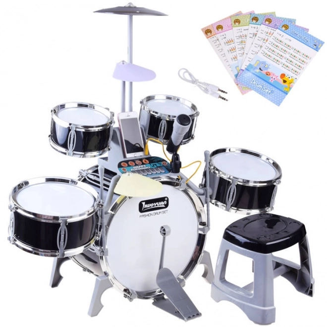 Children's drum set with microphone and music panel