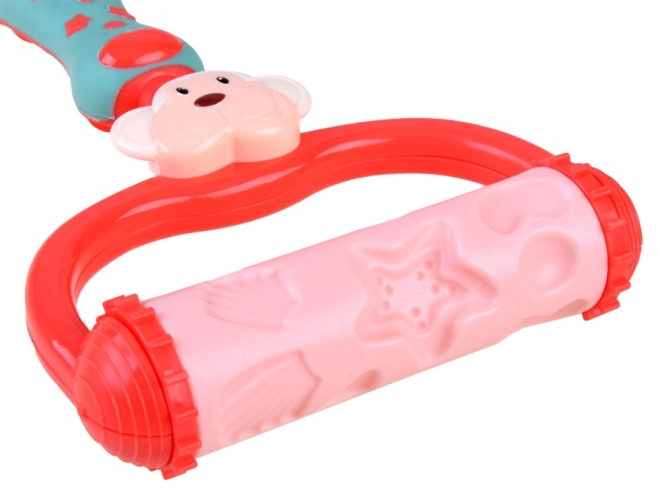 Kleurrijke zandset met emmer en vormpjes