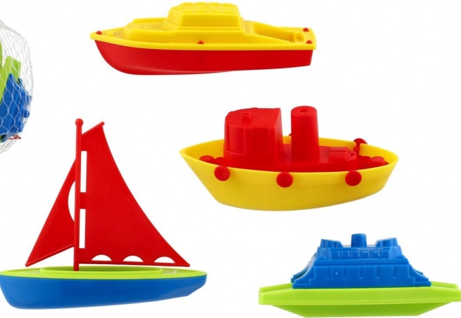 Set de petits bateaux en plastique colorés pour le bain