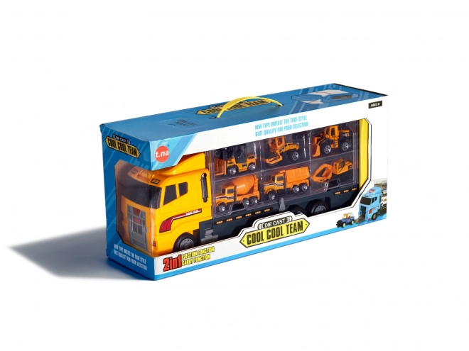 Camion avec petits véhicules de construction
