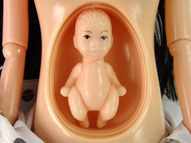Interactive pregnant doll