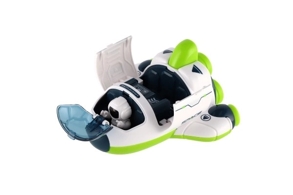 Rakettan/raket plastic 10x11cm met astronaut op inertie 2 kleuren 12 stuks in doos