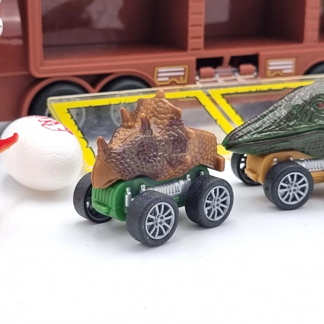 Dinosaurier-Lkw mit Werfer und Autos