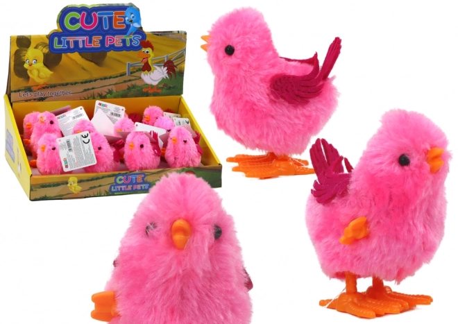 Springend roze kuiken speelgoed