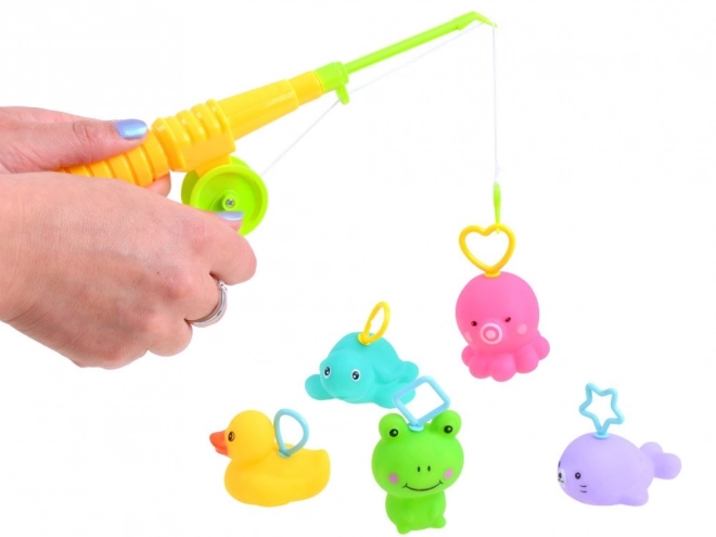 Rubberen dieren met hengel badspeelgoed