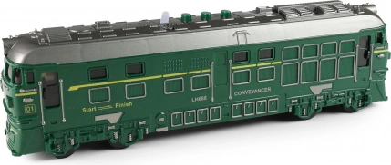 Green locomotive with sound, light, and projector