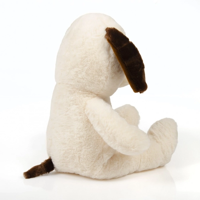 Zittende beige knuffelhondje