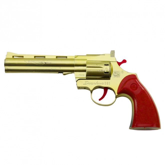 Gouden revolver voor capsules met geluidseffect van een schot