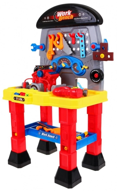 Kinderwerkplaats met motor en lichteffecten