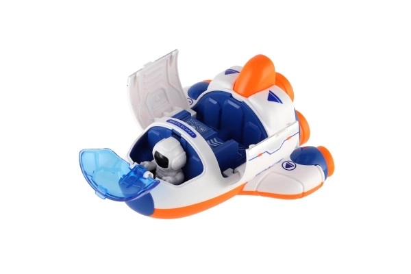Rakettan/raket plastic 10x11cm met astronaut op inertie 2 kleuren 12 stuks in doos