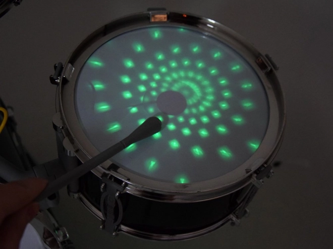 Children's drum set with microphone and music panel