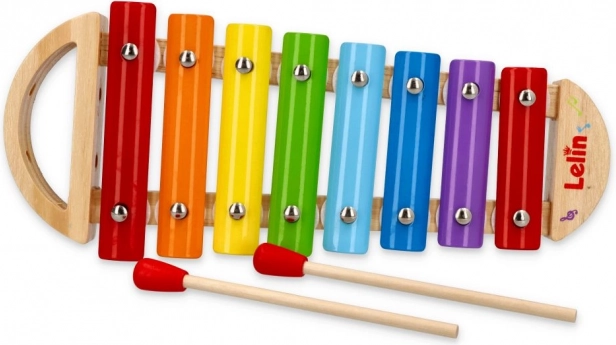 Xylophone métallique coloré dans un cadre en bois pour enfants