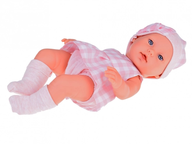 Stoffen paspop pasgeborene met roze muts