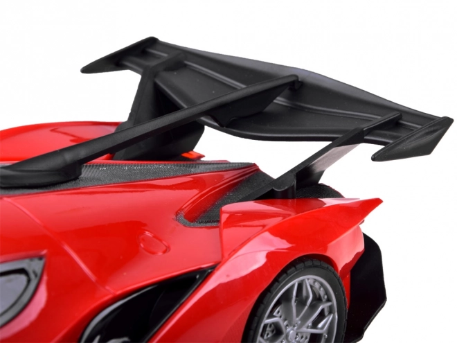 Raceauto met afstandsbediening en accessoires – Rood