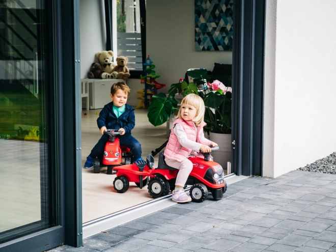 Rijtractor Baby Case IH rood met aanhanger