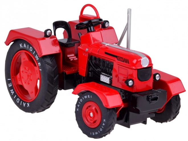 Rode metalen tractor met rubberen wielen 1:18