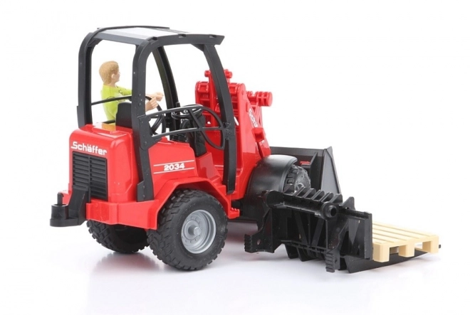 Rode lader Bruder Schäffer 2034 met figuur en accessoires