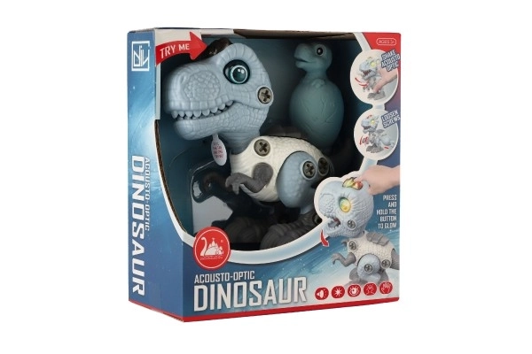 Dinosaurus schroeven plastic 12cm met schroevendraaier op batterijen met licht en geluid in doos 15x16x7cm