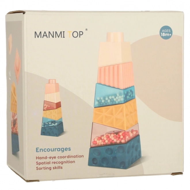 Montessori educatieve toren met balletjes en texturen