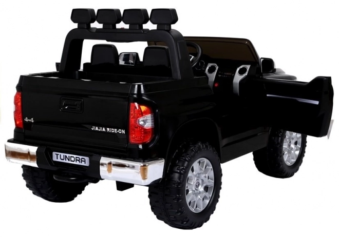 Zwarte elektrische kinderauto Toyota Tundra