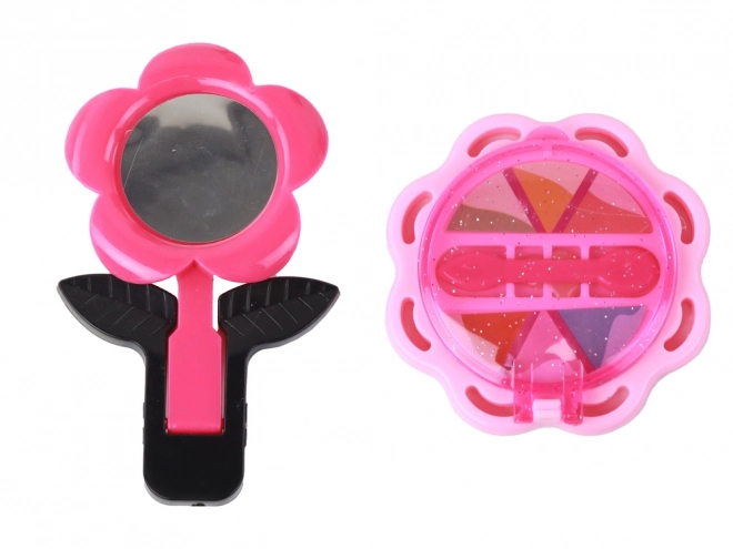 Stilvoller rosa Kinderkoffer mit Kosmetikzubehör