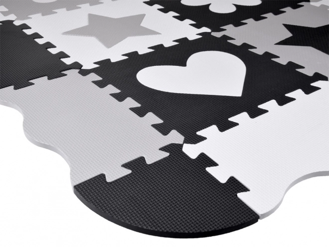 Contrasterende schuim puzzelmat met vormen