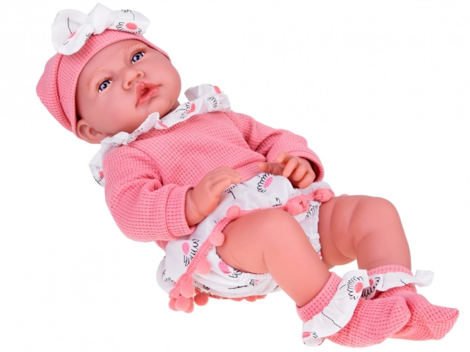 Interactieve pop van 45 cm in roze outfit