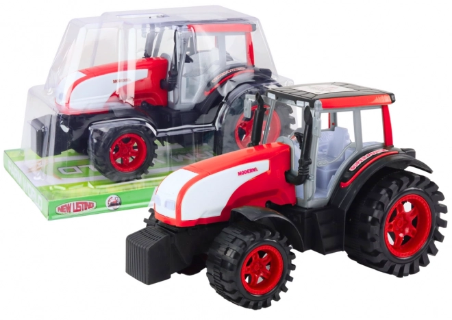 Grand tracteur agricole rouge à entraînement