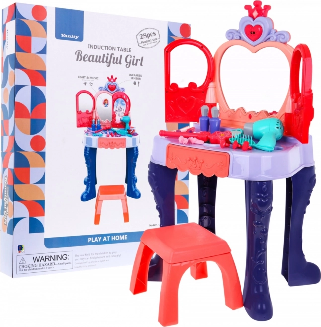 Interactive kids' vanity with magic wand, hairdryer, and 28 accessories