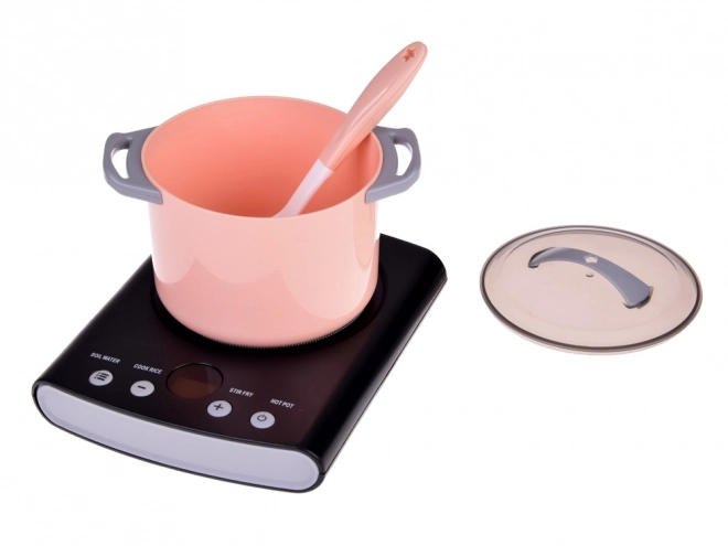 Kinderkeukentje met elektrische kookplaat en servies