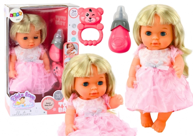 Puppe im rosa Kleid mit Zubehör und Geräuschen